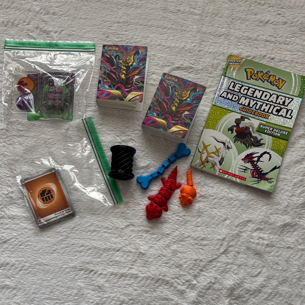 Pokemon Legendary Guidebook with Colorful Accessories & 3D Fidget Toys Bundle